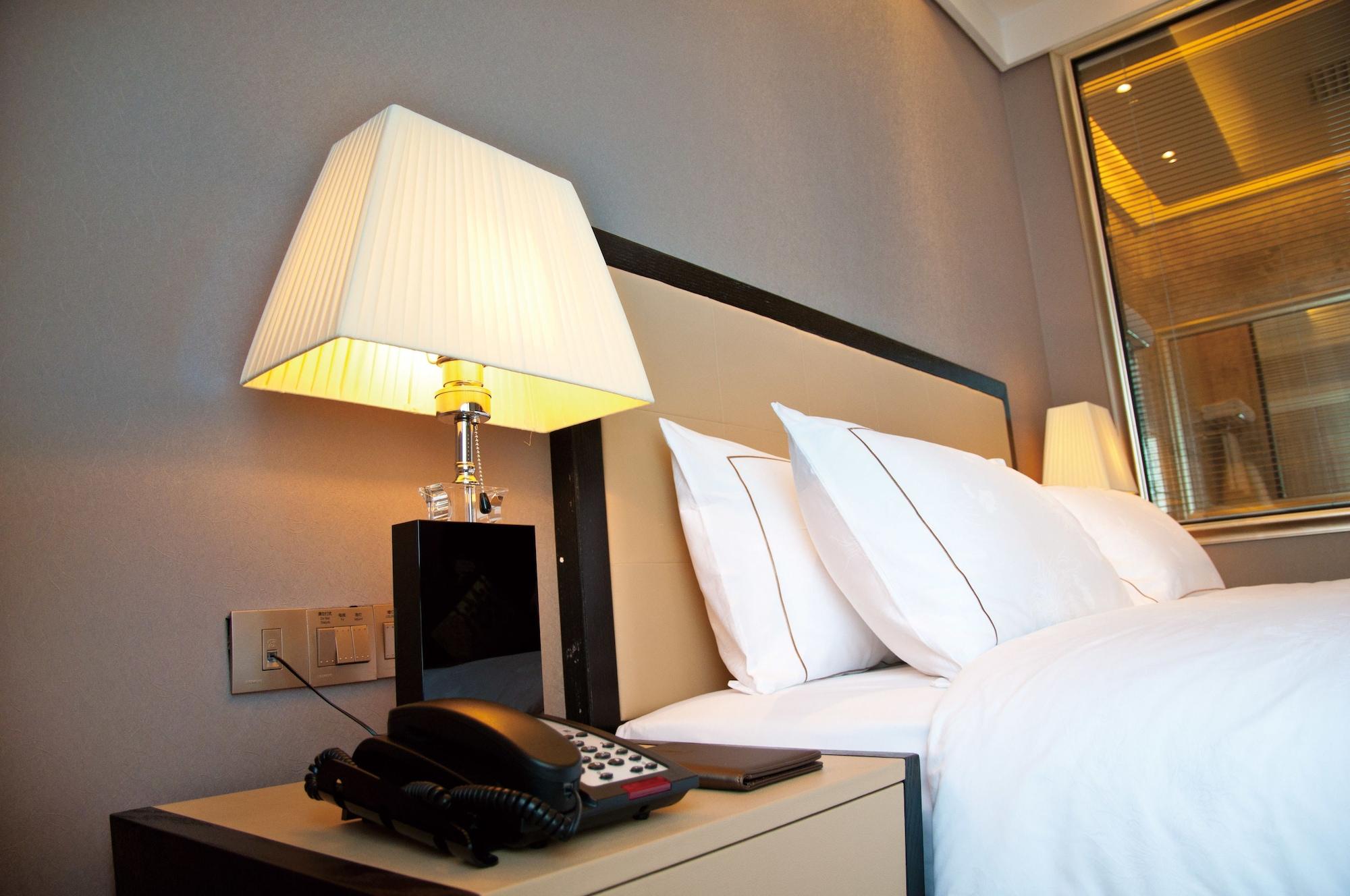 Vertical City Hotel Canton Esterno foto